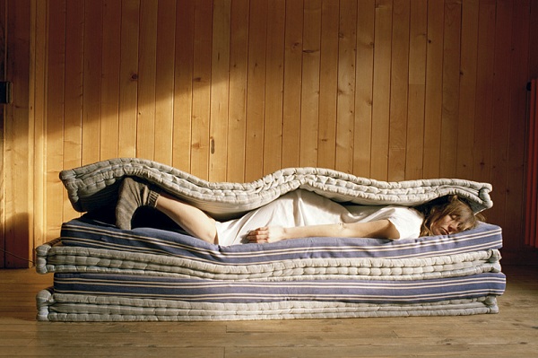 A photograph from the "Self-Portrait with Mattress" series. Photo Courtesy of: Elene Usdin.
