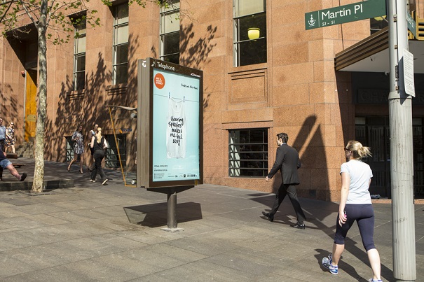A piece from the project "City Lights," with the secret “Wearing speedos makes me feel sexy,” is displayed on the streets of Sydney. Photo Courtesy of: Alphabet Studio.