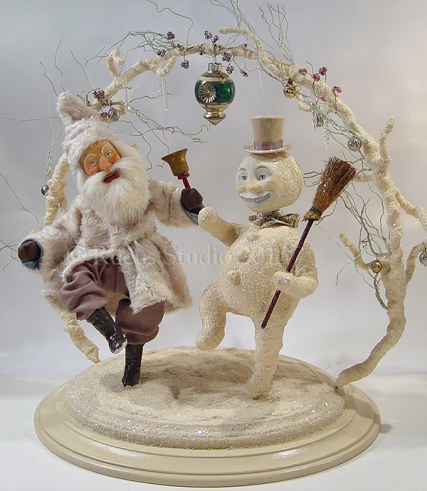 Snowman and Santa dancing in the snow by artist Scott Smith of Rucus Studio. Photo Courtesy of: Scott Smith/Rucus Studio.