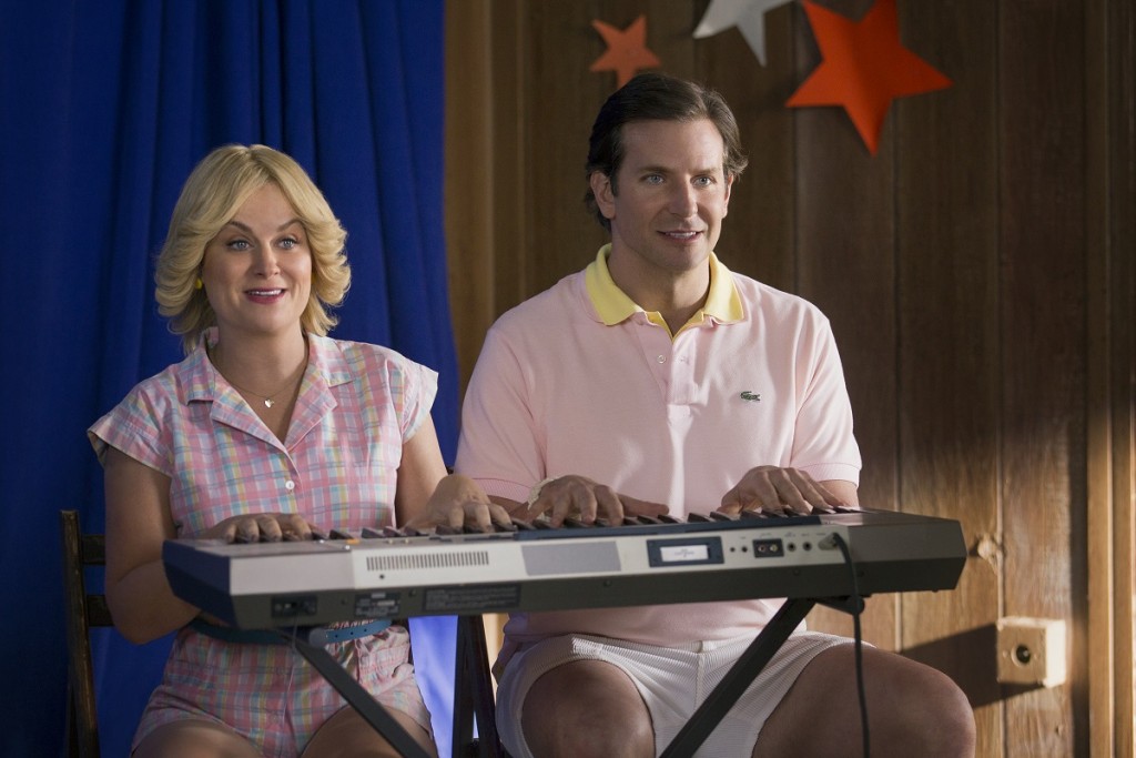 Amy Poehler and Bradley Cooper in the Netflix original series “Wet Hot American Summer: First Day Of Camp”. Photo by: Saeed Adyani/Netflix.