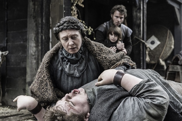 Annette Tierney as Old Nan and Sam Coleman as a young Hodor in Season 6 of Game of Thrones. Photo Credit: Helen Sloan/courtesy of HBO.